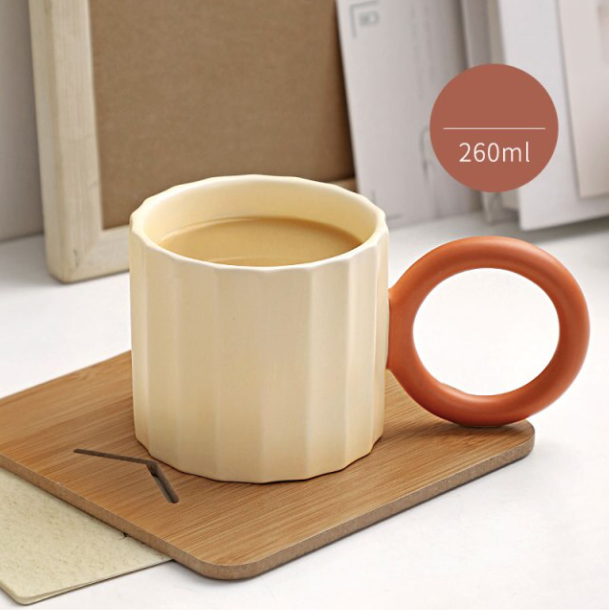 Handmade Ceramic Coffee Mug: Green with Orange Handle